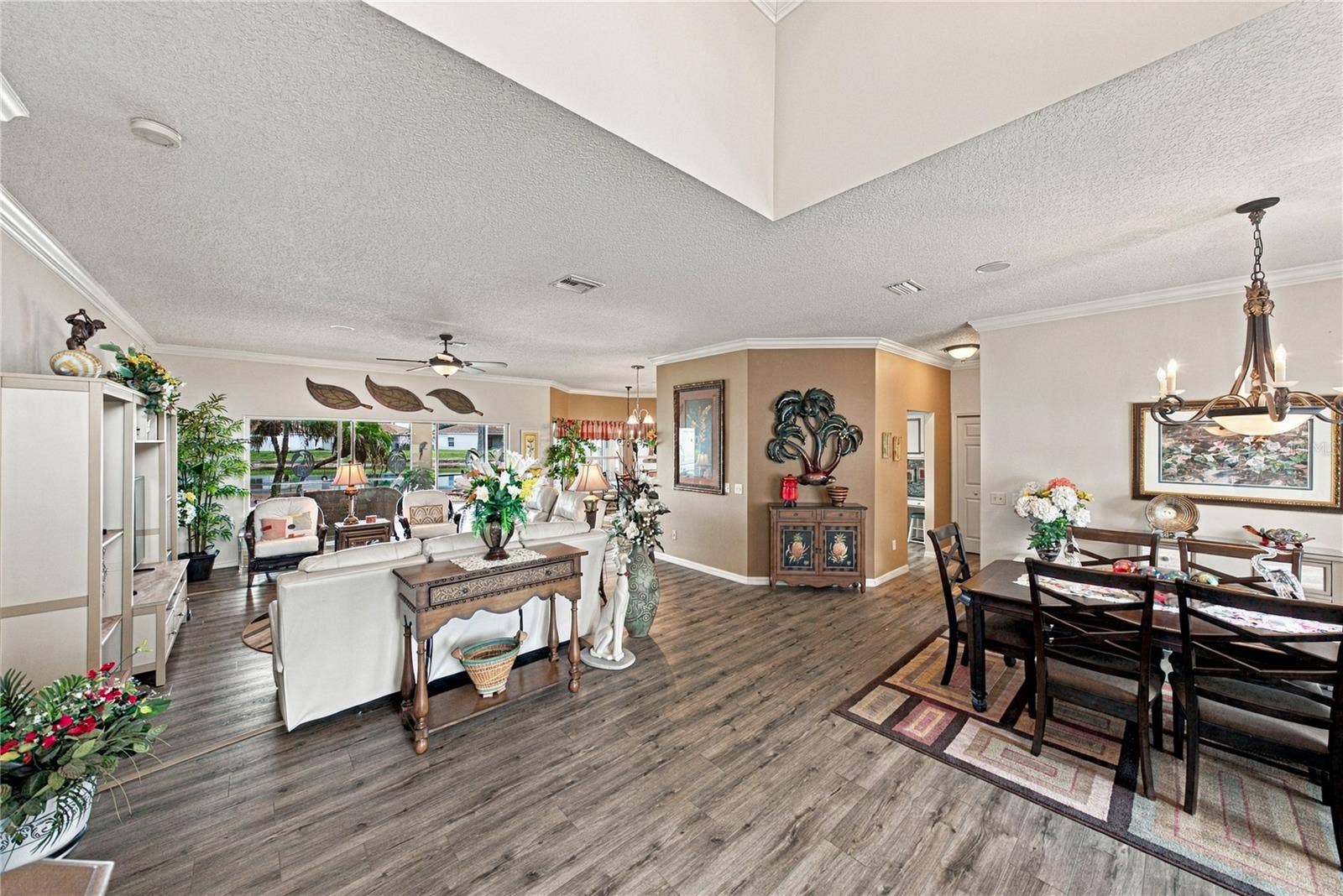 4232 DORNOCH DRIVE, Lake Wales, FL 33859 This view from the foyer shows the efficiency of the home's layout from the foyer to the dining room to the living room to the kitchen and dinette.