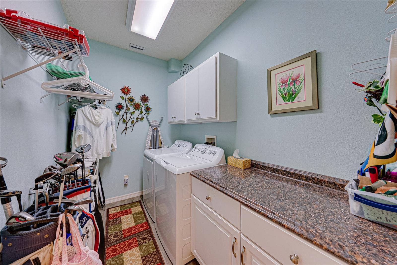 4232 DORNOCH DRIVE, Lake Wales, FL 33859 The inside laundry room is just off the kitchen and features additional storage and cabinetry. The new washer and dryer stay.