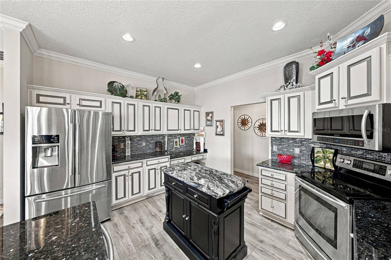 4232 DORNOCH DRIVE, Lake Wales, FL 33859 The newer stainless-steel appliances and prep island are pluses!