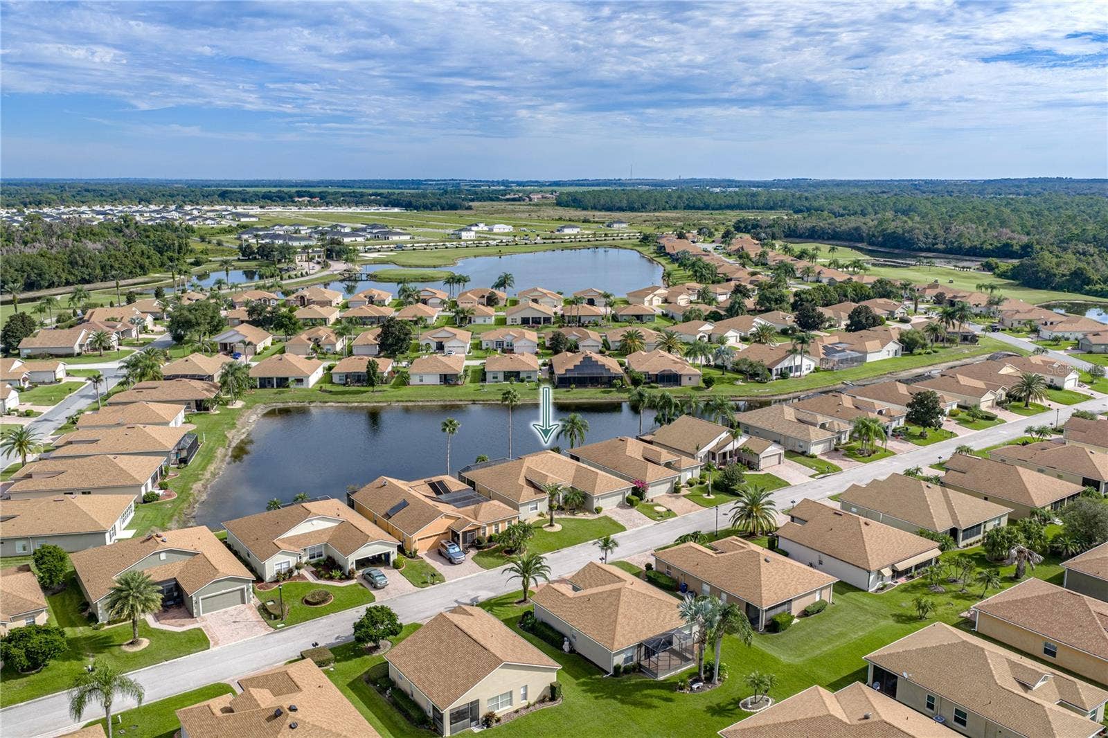 4232 DORNOCH DRIVE, Lake Wales, FL 33859 The entrance to Lake Ashton is in the background, making easy access to the outside world easy.
