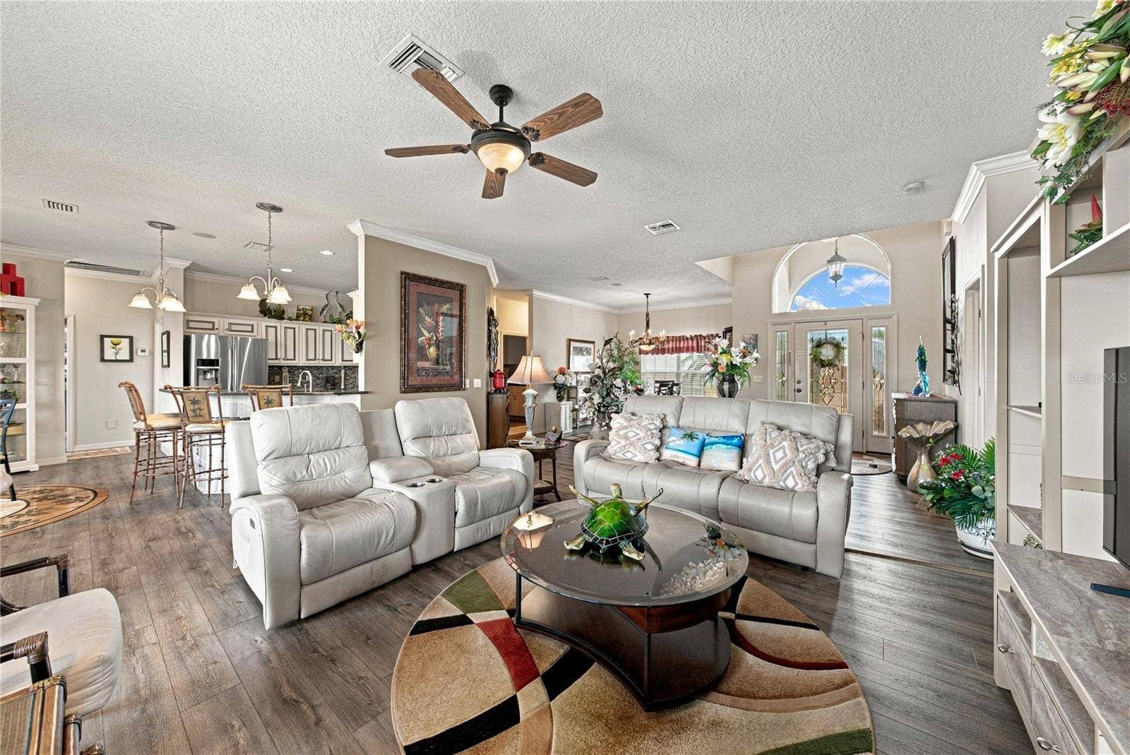 4232 DORNOCH DRIVE, Lake Wales, FL 33859 This view shows the relationship between the living room and the adjacent kitchen.