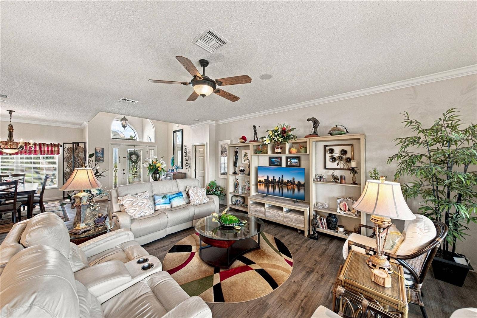 4232 DORNOCH DRIVE, Lake Wales, FL 33859 This view of the living room shows the foyer and dining room blending together.