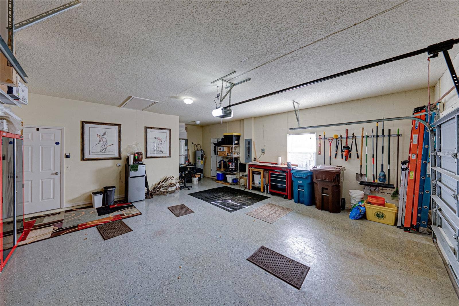 4232 DORNOCH DRIVE, Lake Wales, FL 33859 The extra wide garage allows for additional storage.