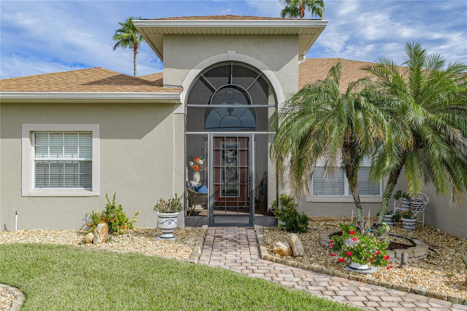 4232 DORNOCH DRIVE, Lake Wales, FL 33859 The screened covered front entry adds another place to enjoy the famous Florida climate. The screening adds a level of security while making cross ventilation a "breeze".