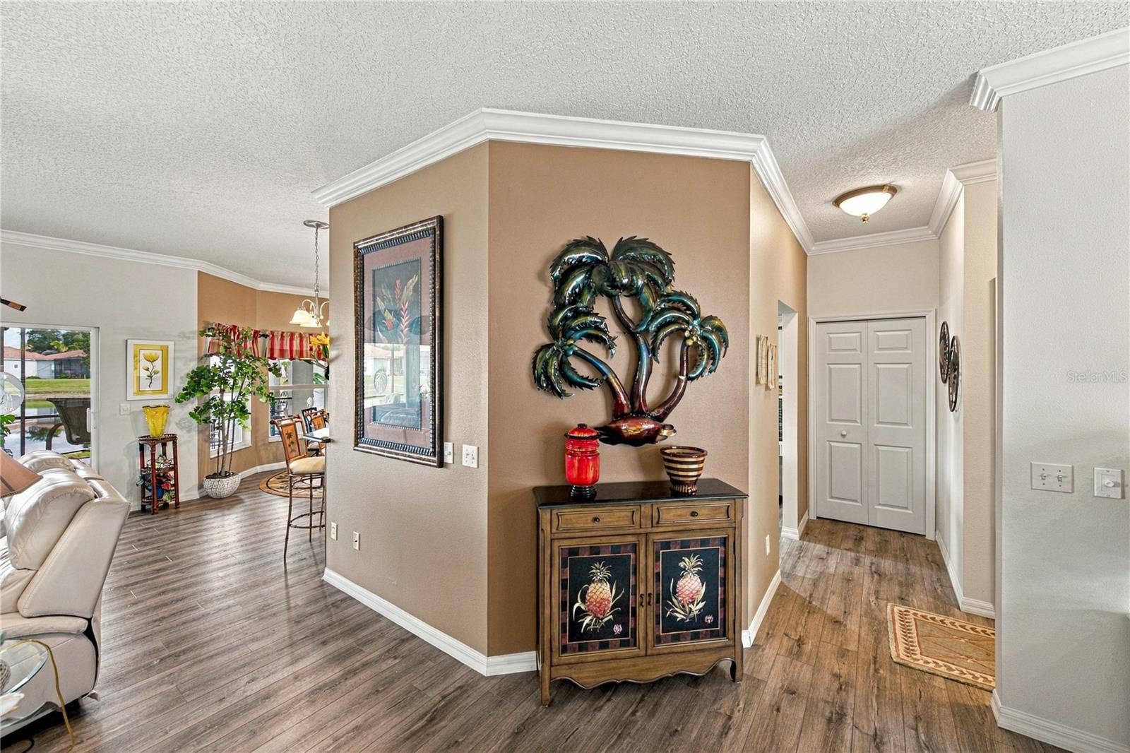 4232 DORNOCH DRIVE, Lake Wales, FL 33859 The presence of crown molding throughout the home adds class! The closet pantry is on the right.