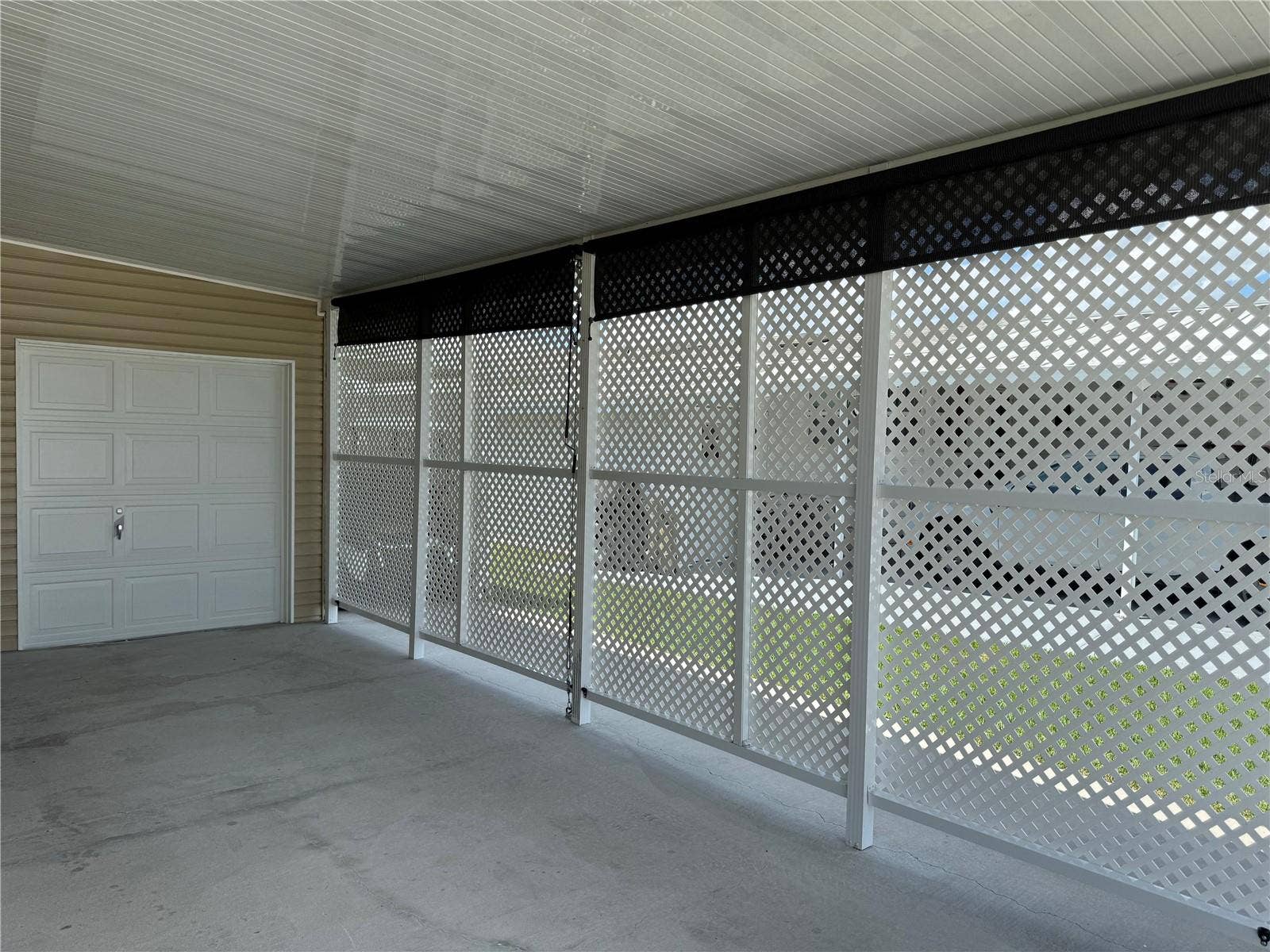 57 STRAPHMORE DRIVE, Haines City, FL 33844 Carport with latice protection