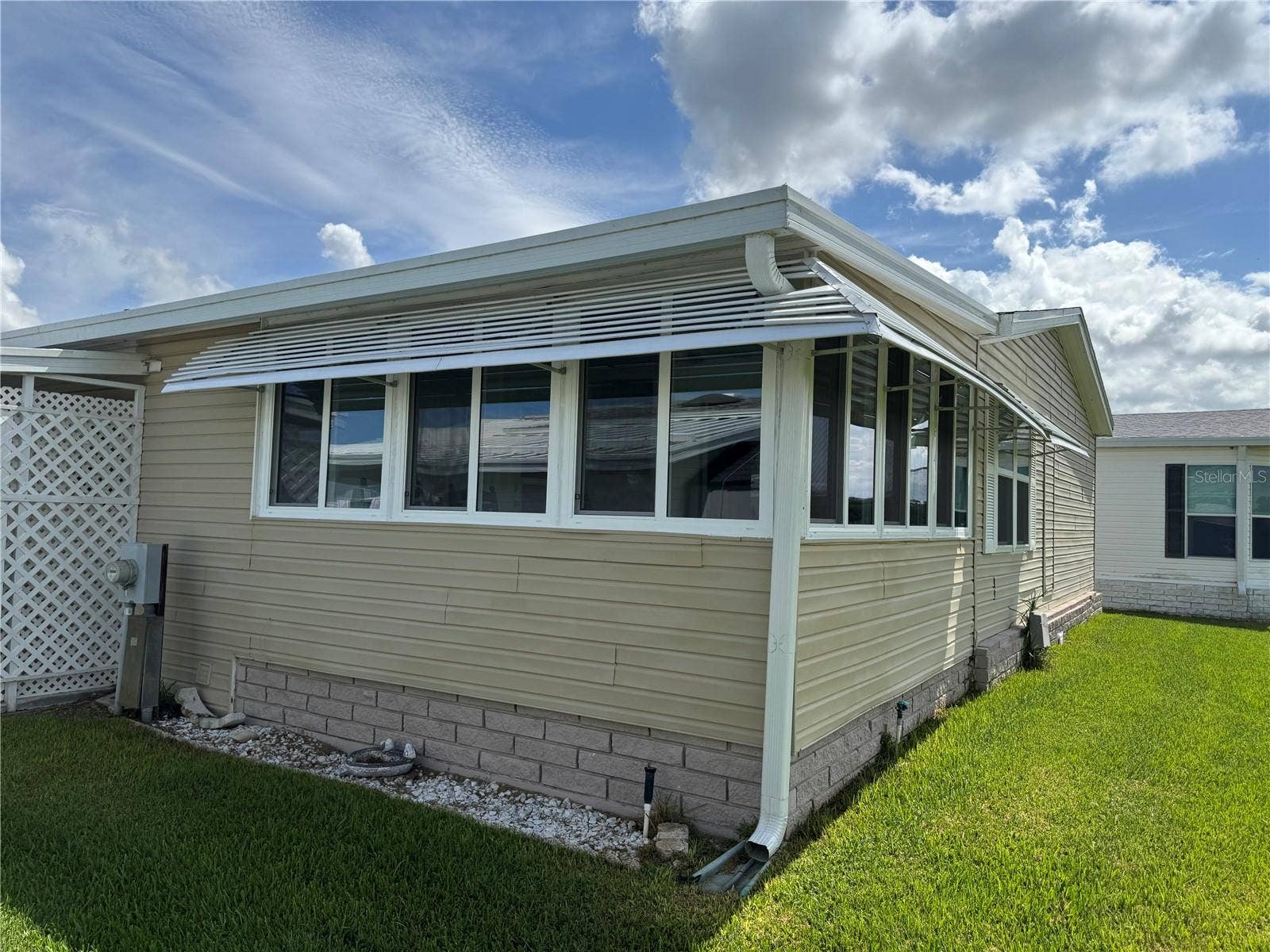 57 STRAPHMORE DRIVE, Haines City, FL 33844 Rear view -Florida Room that looks over golf course