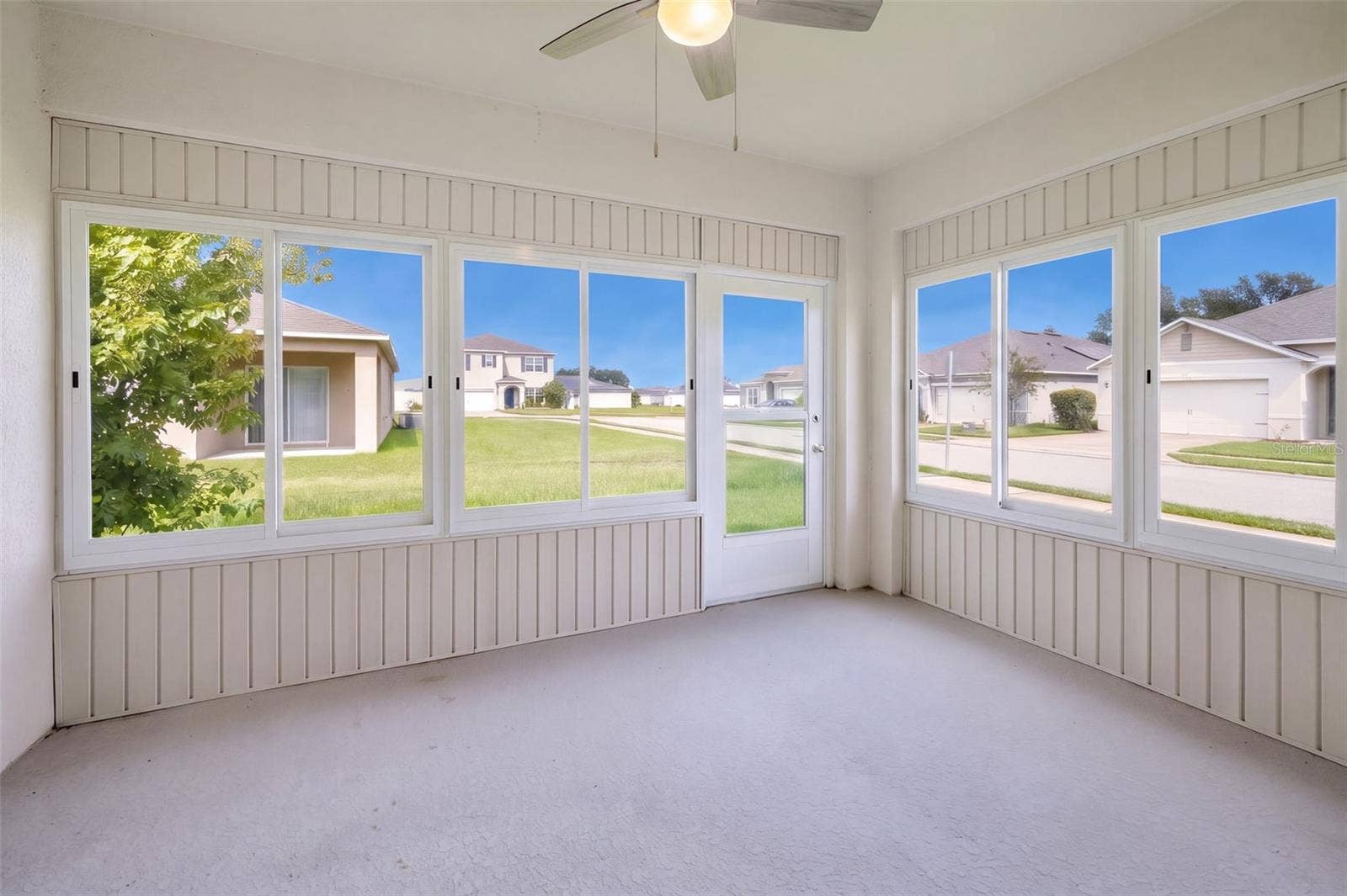 2415 BRASSIE COURT, Winter Haven, FL 33884 Florida Room features hurricane impact windows & door