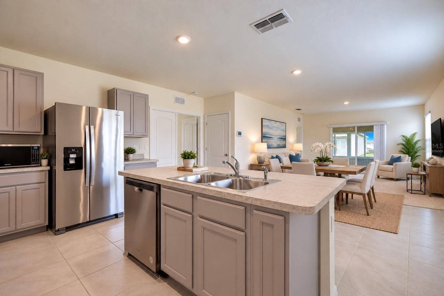 2415 BRASSIE COURT, Winter Haven, FL 33884 Virtually Staged, The center island provides convenient seating for casual dining
