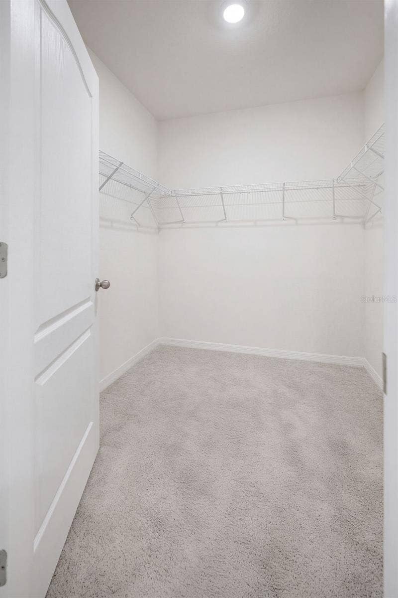 2415 BRASSIE COURT, Winter Haven, FL 33884 Primary Bedroom offers a Walk-in Closet