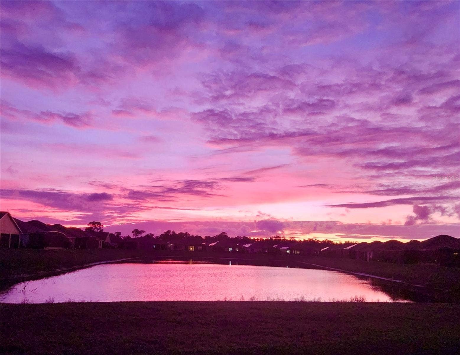 6125 PEBBLE BEACH BOULEVARD, Winter Haven, FL 33884 Sunset over the pond
