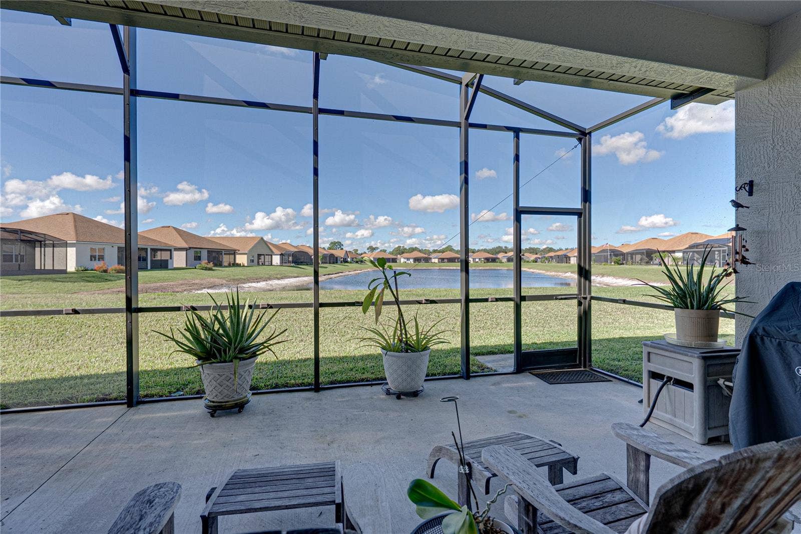 6125 PEBBLE BEACH BOULEVARD, Winter Haven, FL 33884 Extended, screened veranda