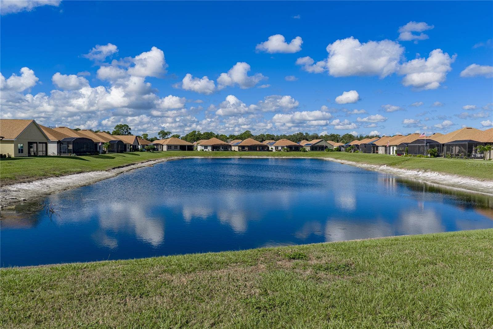 6125 PEBBLE BEACH BOULEVARD, Winter Haven, FL 33884 Pond behind the house
