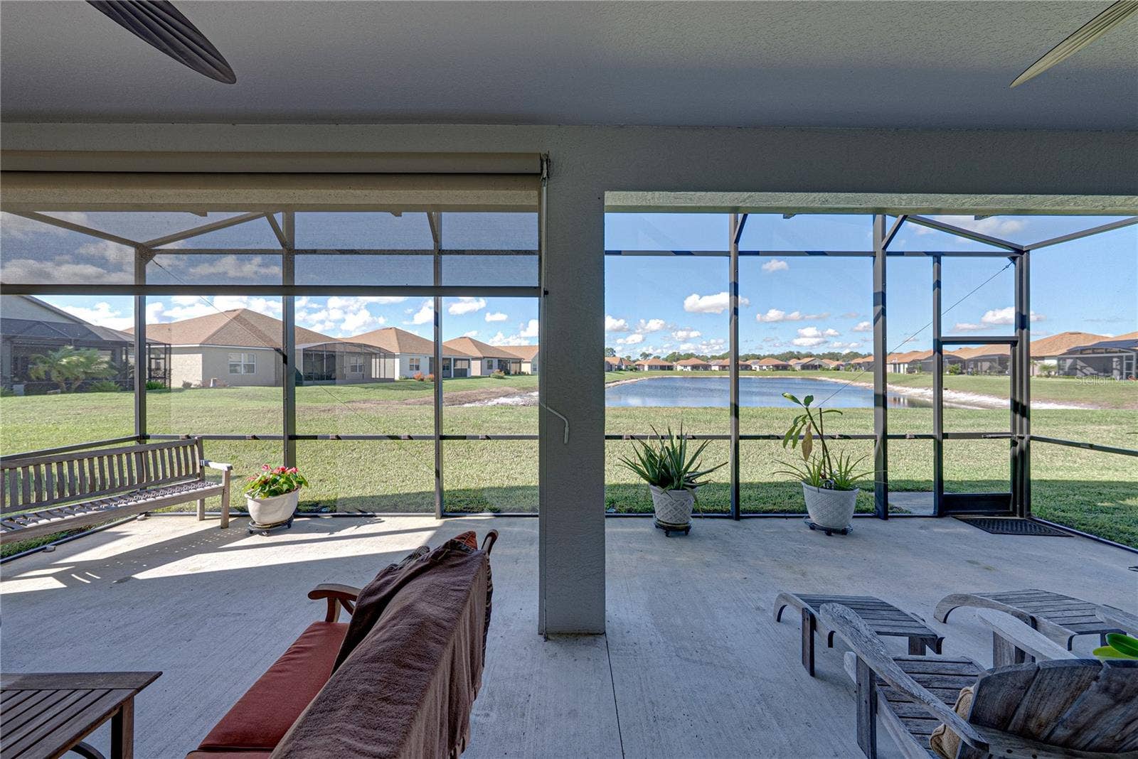 6125 PEBBLE BEACH BOULEVARD, Winter Haven, FL 33884 Extended, screened veranda