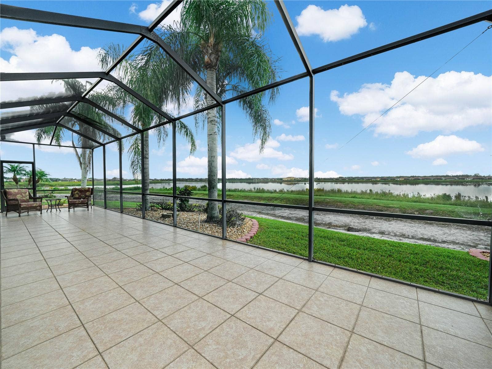 5385 HOGAN LANE, Winter Haven, FL 33884 Tiled Birdcage Overlooking the Lake