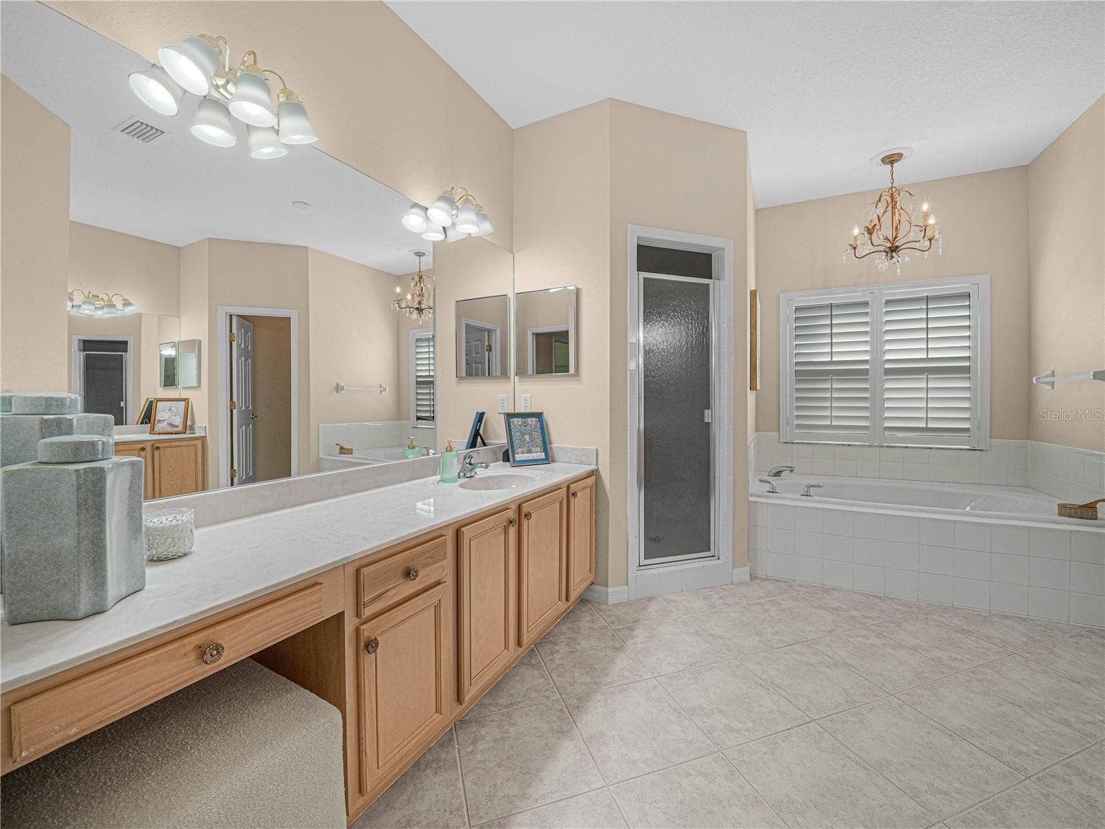 4299 ASHTON CLUB DRIVE, Lake Wales, FL 33859 Primary Bath with His/Her Vanity. Makeup Seat