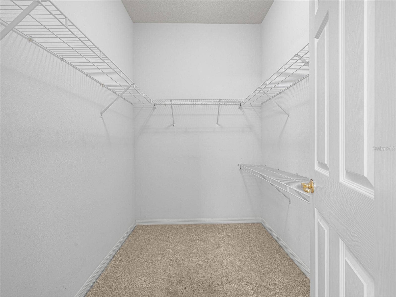 4299 ASHTON CLUB DRIVE, Lake Wales, FL 33859 His/Her Walk In Closet in Primary Suite