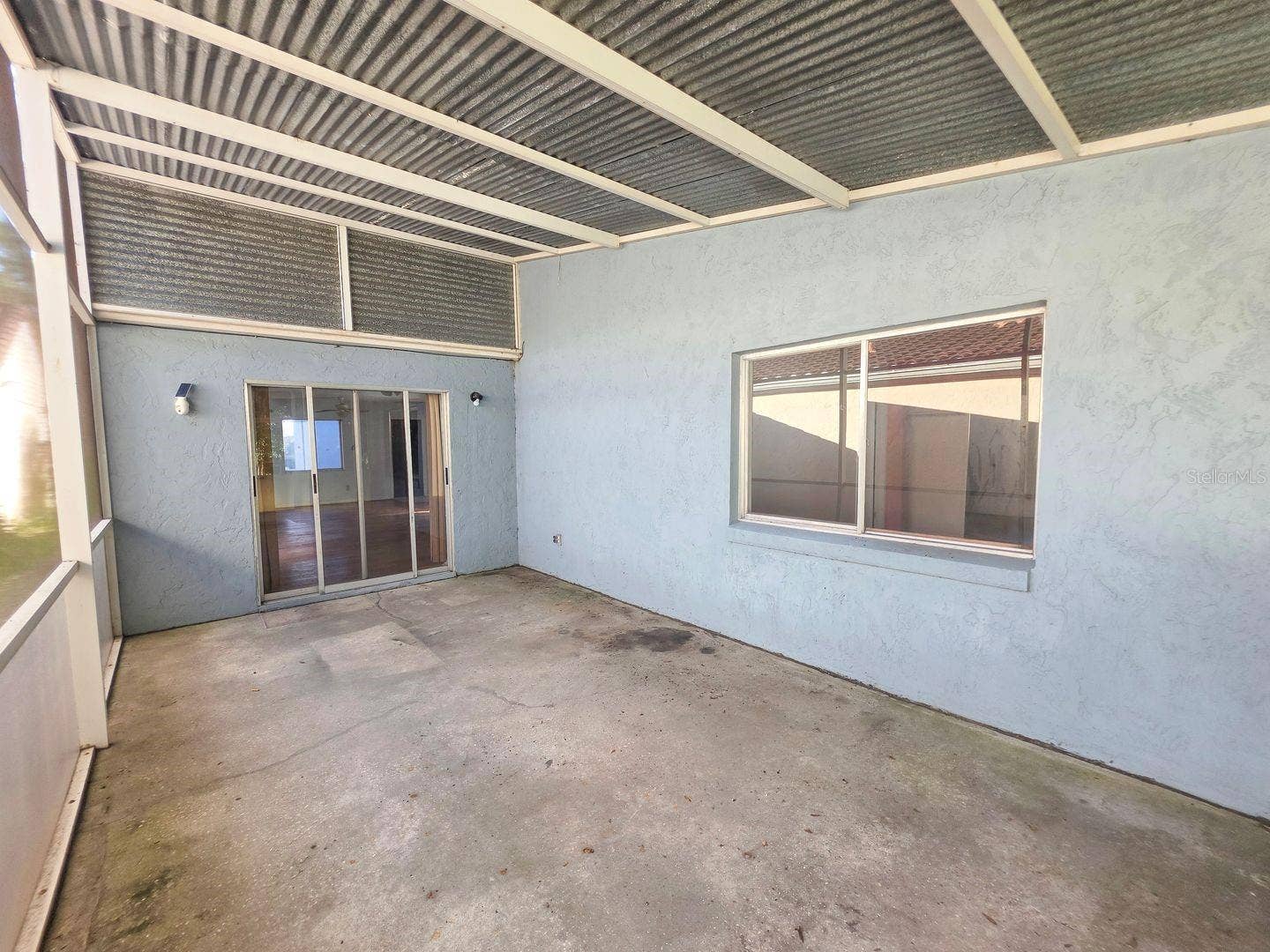 395 SAN JOSE DR, Winter Haven, FL 33884 Back screened patio