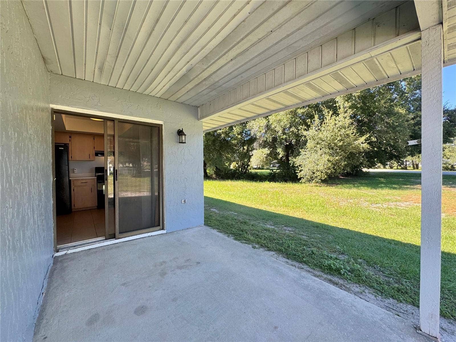 924 SUNSHINE WAY SW, Winter Haven, FL 33880 Covered rear patio