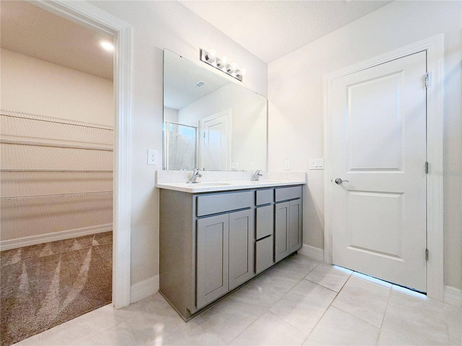 1079 MICHELANGELO LANE, Winter Haven, FL 33884 Dual sinks and a large walk in closet