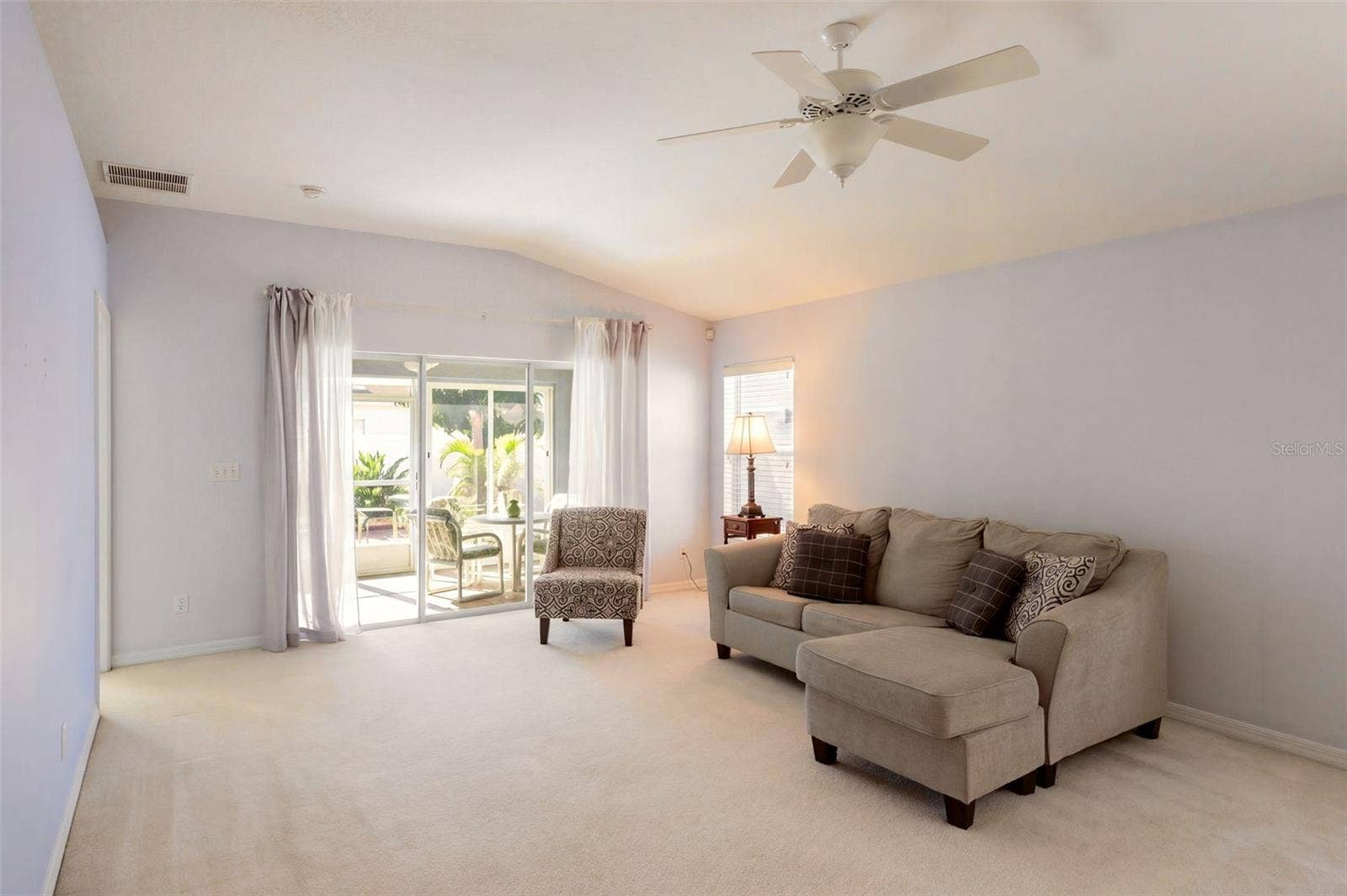 3437 GRENVILLE DRIVE, Winter Haven, FL 33884 Living Room with Vaulted Ceilings