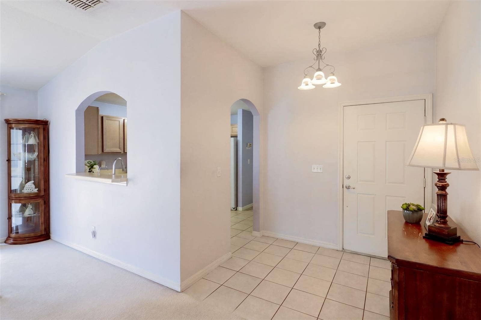 3437 GRENVILLE DRIVE, Winter Haven, FL 33884 Foyer features tile flooring