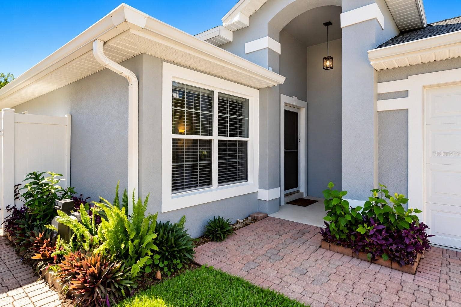 3437 GRENVILLE DRIVE, Winter Haven, FL 33884 Charming covered entrance with glass storm door