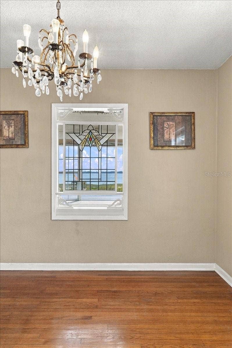 1501 N LAKE HOWARD DRIVE, Winter Haven, FL 33881 Ornate stained-glass in dining room