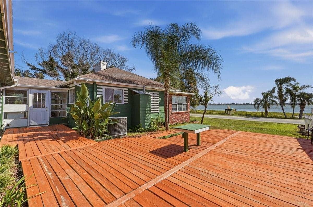 1501 N LAKE HOWARD DRIVE, Winter Haven, FL 33881 Large sundeck between mainhouse & guesthouse