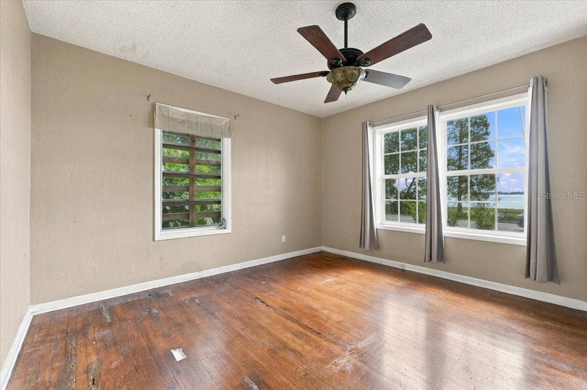 1501 N LAKE HOWARD DRIVE, Winter Haven, FL 33881 Primary Bedroom has lakefront views