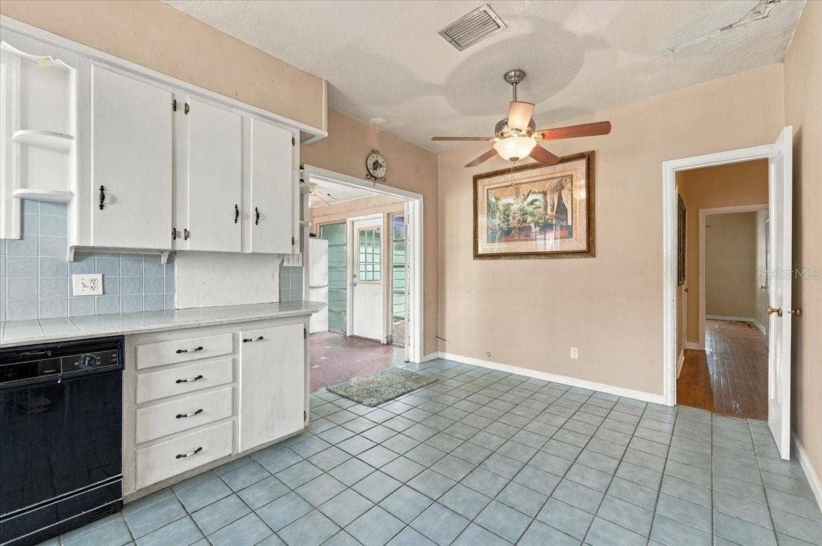 1501 N LAKE HOWARD DRIVE, Winter Haven, FL 33881 kitchen leads to laundry room