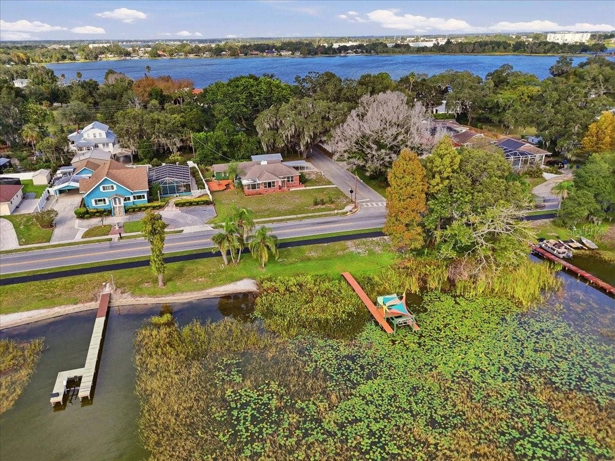 1501 N LAKE HOWARD DRIVE, Winter Haven, FL 33881 Aerial view of dock, lake & home