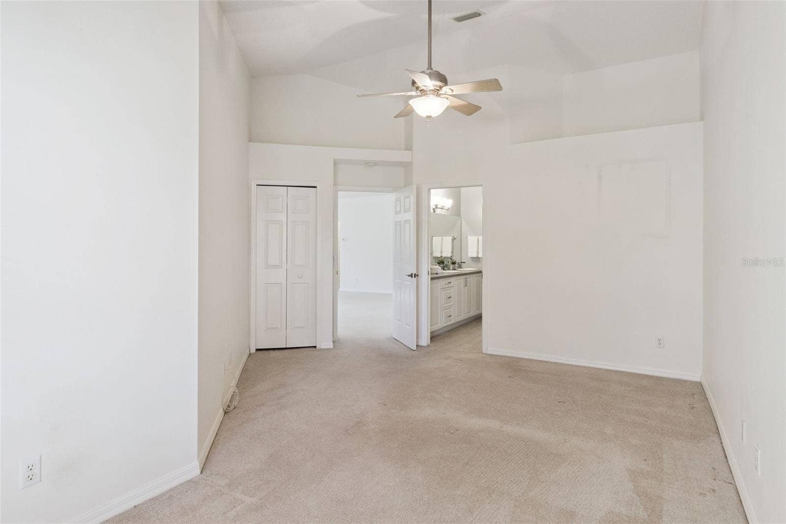 Vaulted Ceilings & Linen Closet are featured in the Primary BedroomPrimary Bedroom features a niche for a sitting area