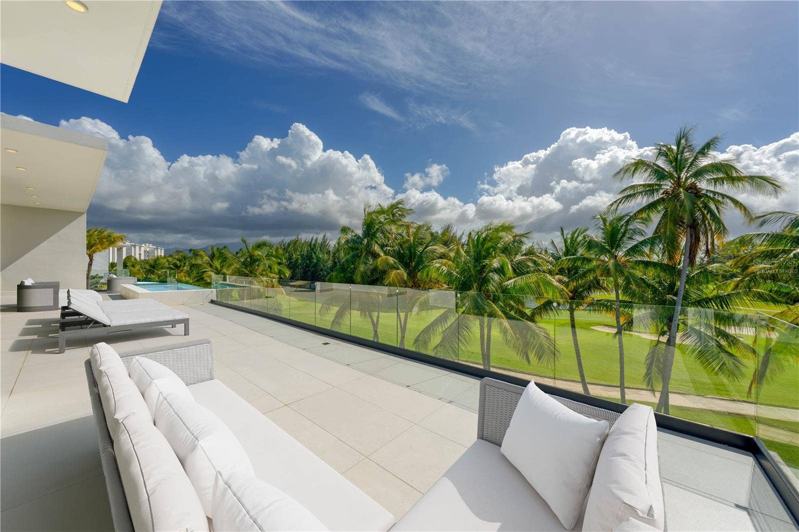 G8 ATLANTIC DRIVE, 7000 BAHIA BEACH BLVD., Rio Grande, PR 00745 Terrace - This image has been virtually staged and does not reflect the current state of the property.