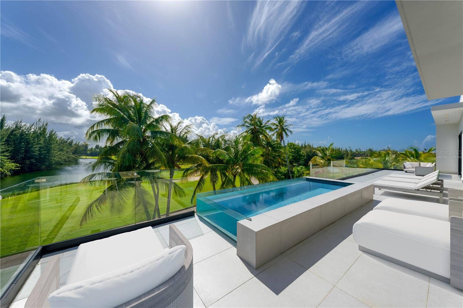 G8 ATLANTIC DRIVE, 7000 BAHIA BEACH BLVD., Rio Grande, PR 00745 Terrace - This image has been virtually staged and does not reflect the current state of the property.