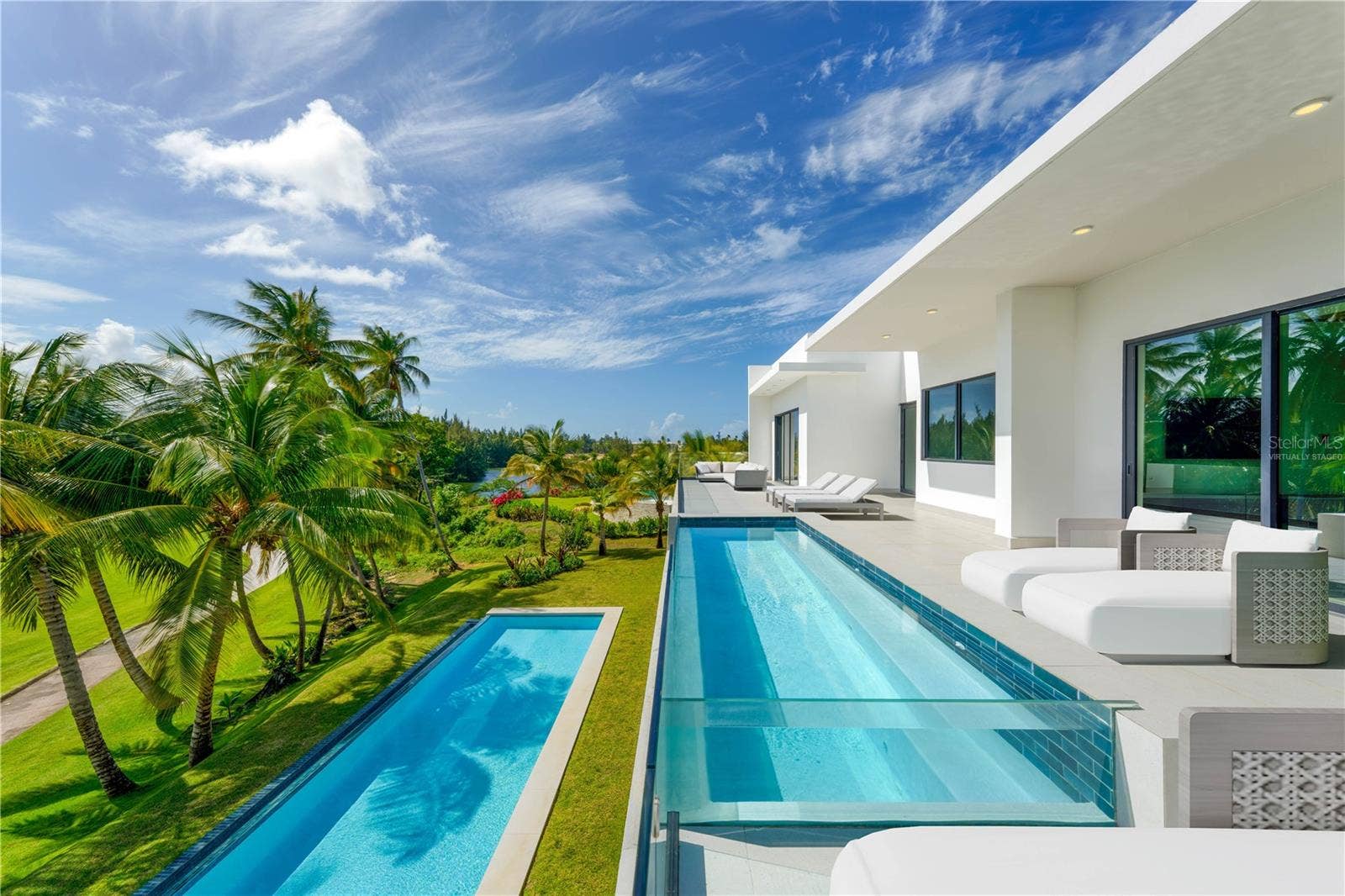 G8 ATLANTIC DRIVE, 7000 BAHIA BEACH BLVD., Rio Grande, PR 00745 Terrace - This image has been virtually staged and does not reflect the current state of the property.