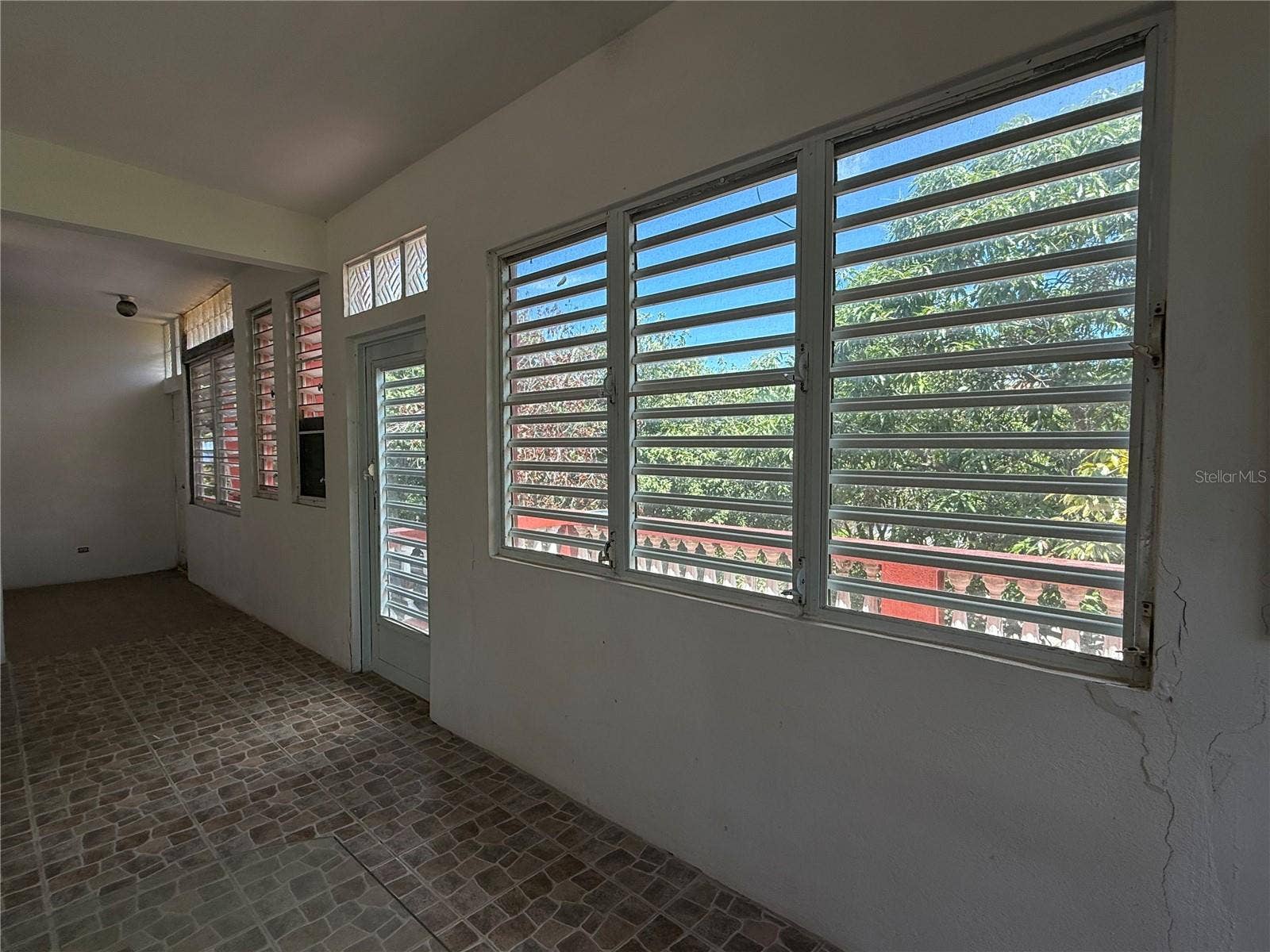 524 COMM SANTA MARIA, Vieques, PR 00765 Foyer/Hallway into First Bedroom/ Balcony.