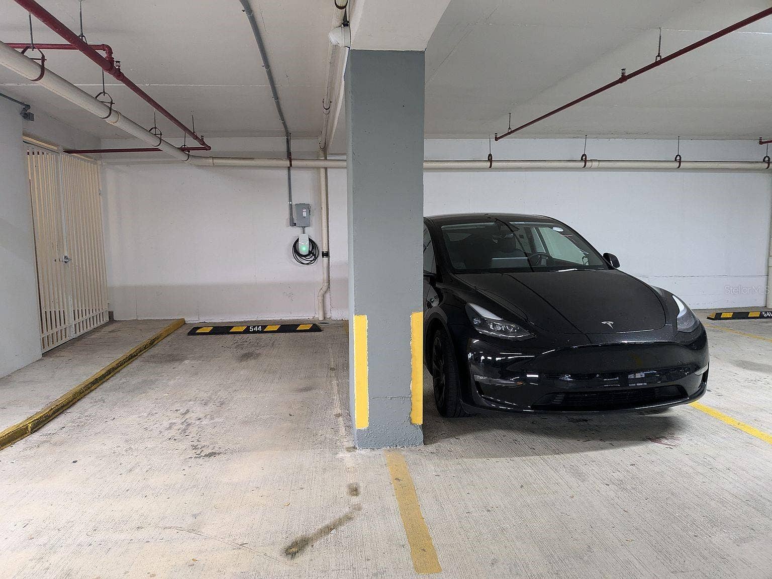 305 CALLE VILLAMIL, #PH 2001, San Juan, PR 00907 Parking assigned space with EV charger (included)