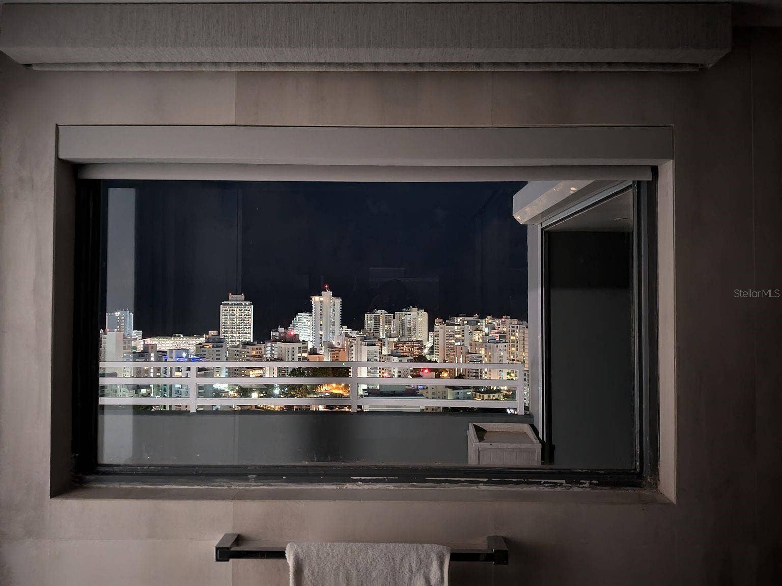 305 CALLE VILLAMIL, #PH 2001, San Juan, PR 00907 Bathroom window night skyline view