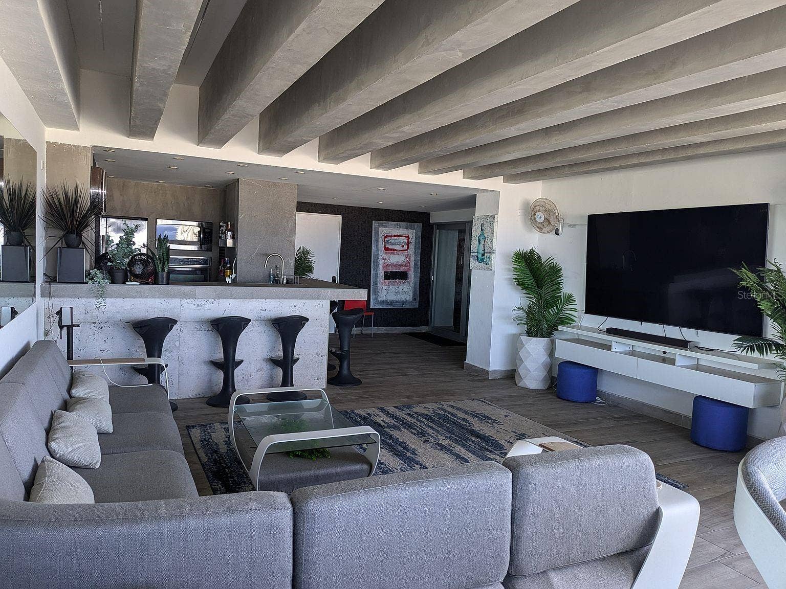 305 CALLE VILLAMIL, #PH 2001, San Juan, PR 00907 Terrace full second kitchen and bar with media wall