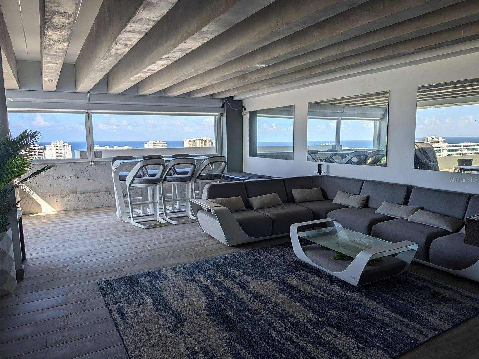 305 CALLE VILLAMIL, #PH 2001, San Juan, PR 00907 Covered terrace lounge ocean views