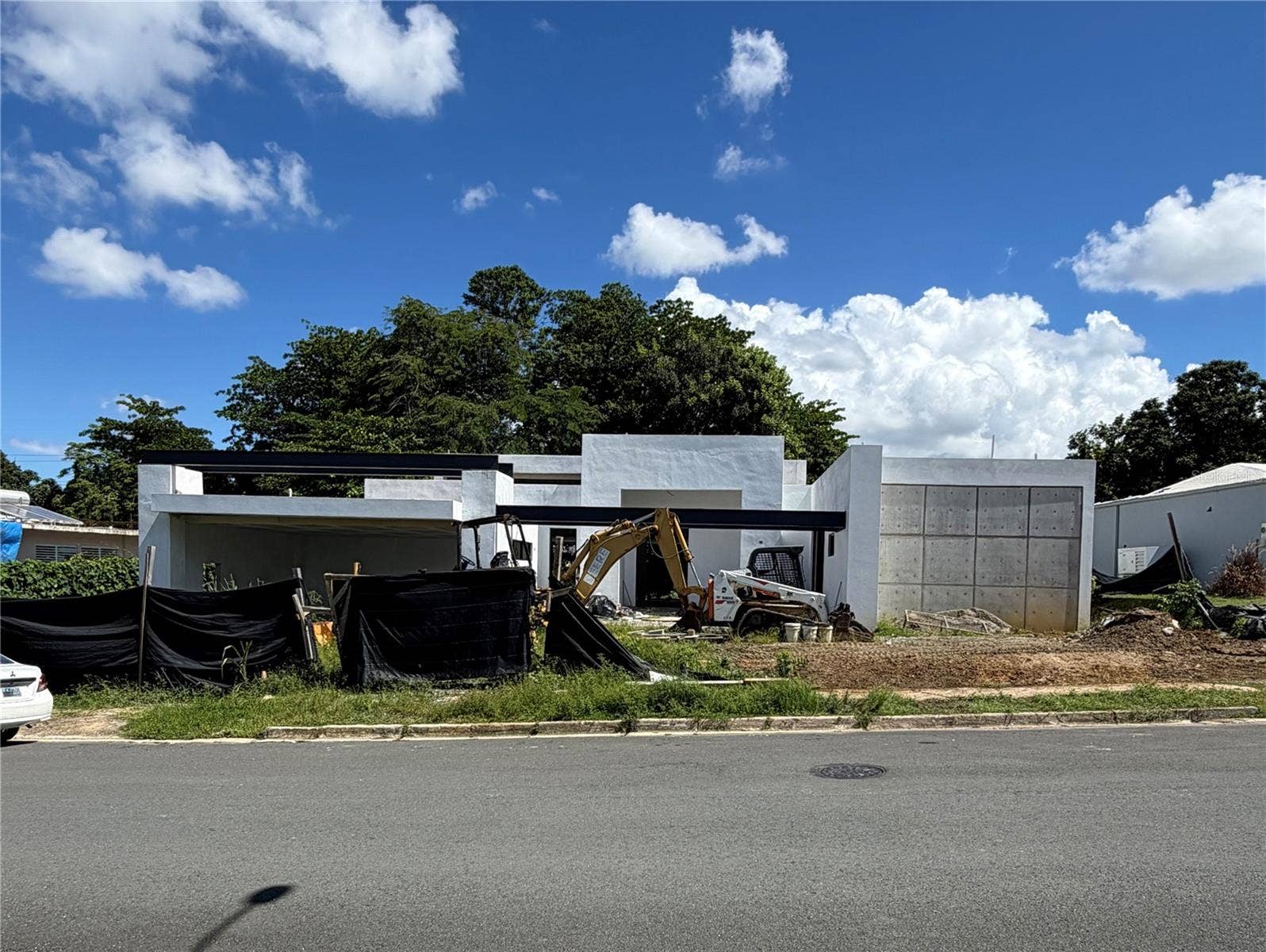 137 CALLE VIOLETA, San Juan, PR 00927 Current exterior front view, under construction