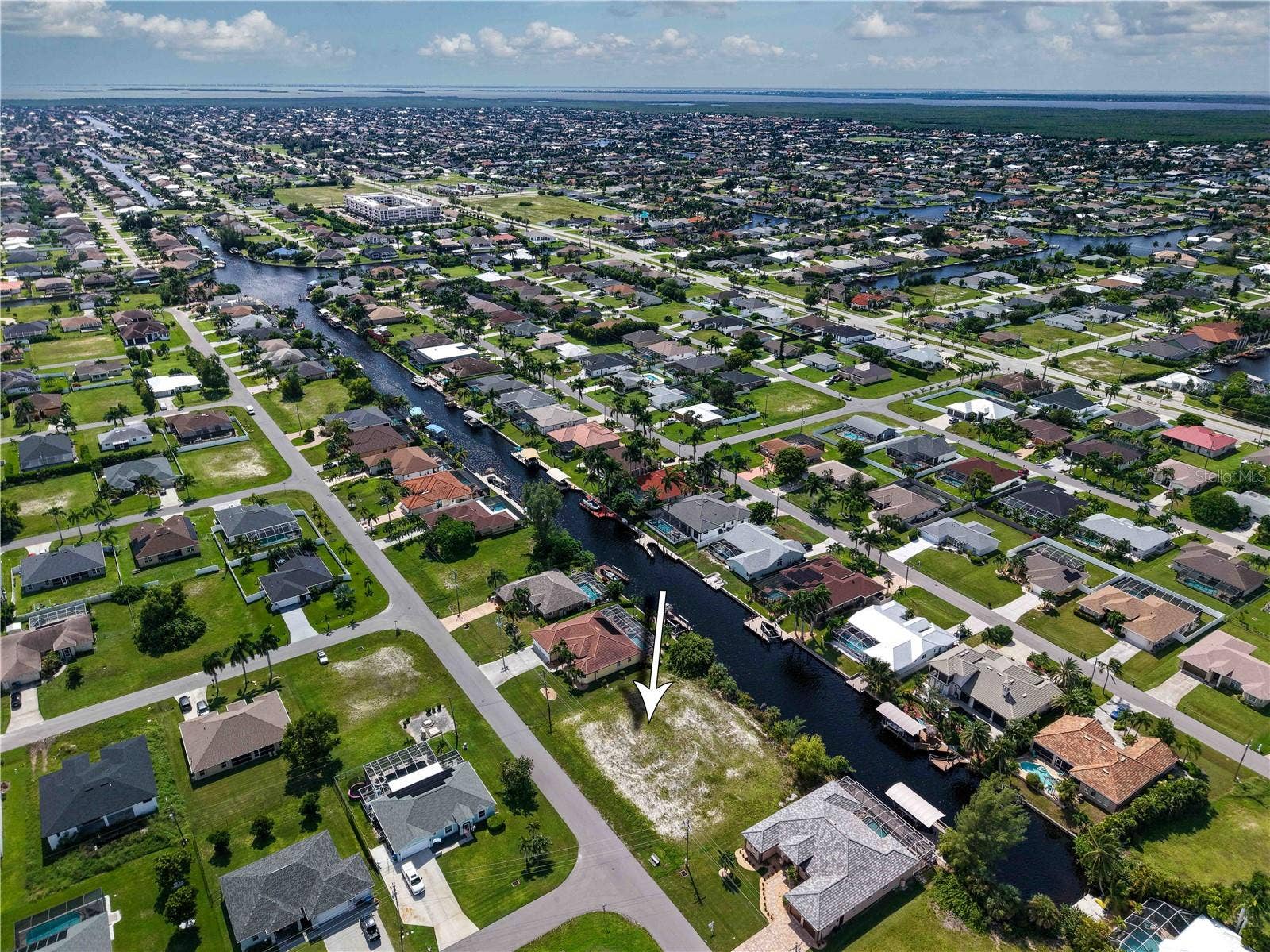 3818 SW 19TH PLACE, Cape Coral, FL 33914 CANAL AERIAL 3