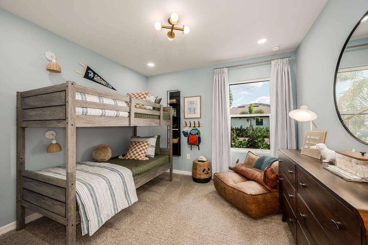 Bedroom 2-Photo description represents the model home of same floor plan.
