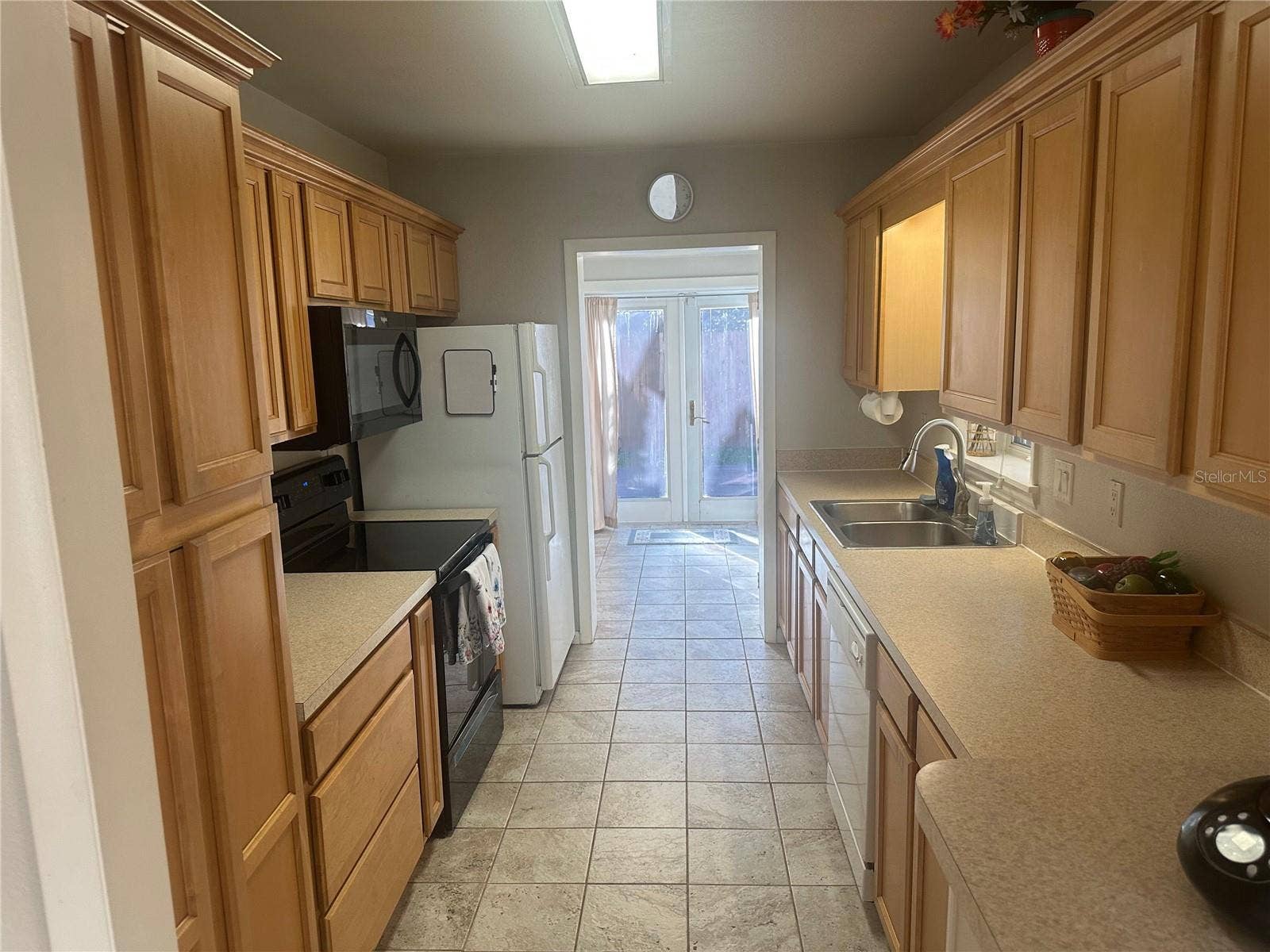 204 W 36TH STREET W, Bradenton, FL 34205 KITCHEN VIEW TO LAUNDRY