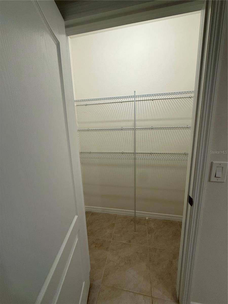 4016 SAPSUCKER LOOP, Sanford, FL 32773 Storage closet in primary bathroom