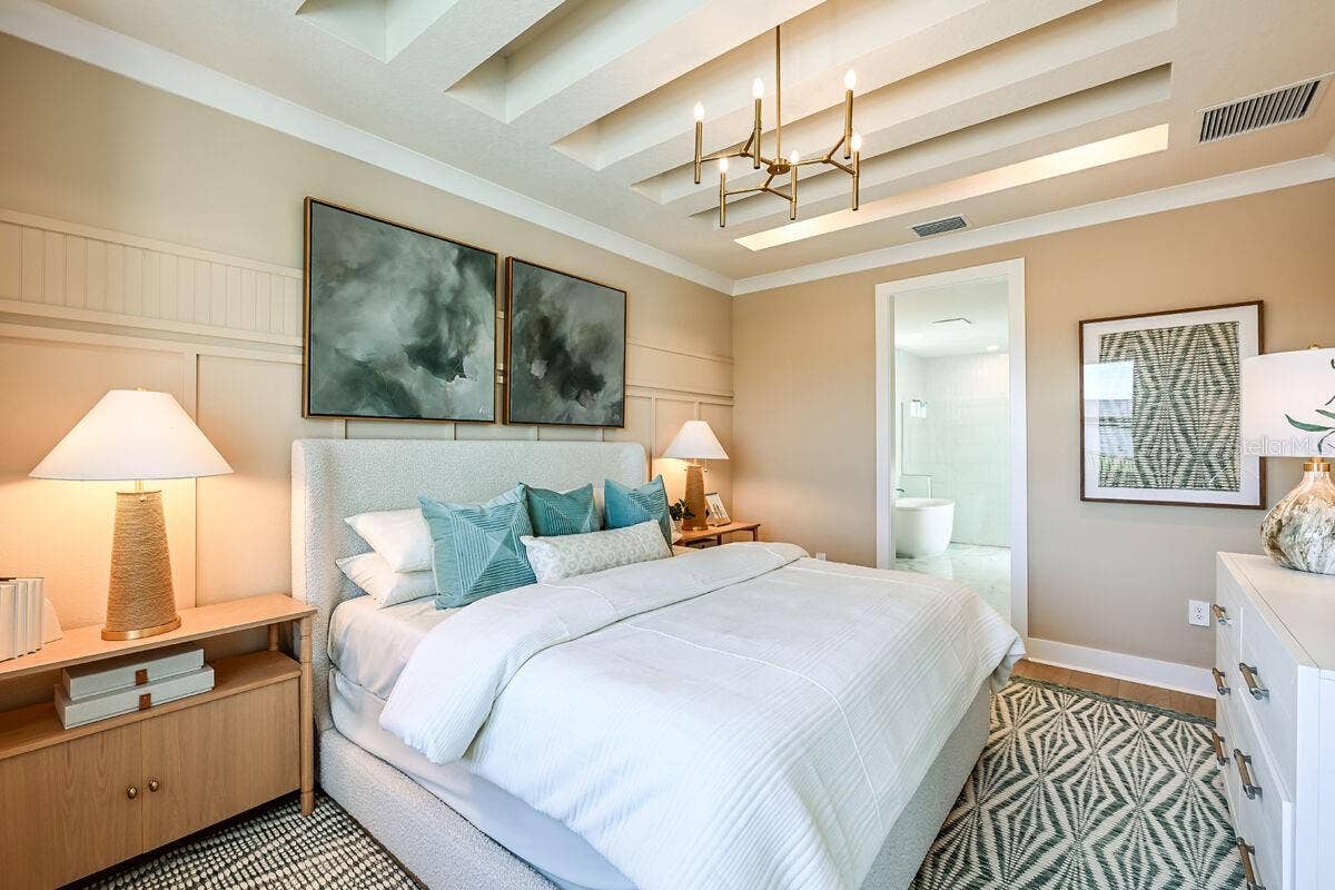 24496 SW KINGSWAY CIRCLE, Lake Suzy, FL 34269 Primary Bedroom-Pictures are of Model Home for representational purposes only.