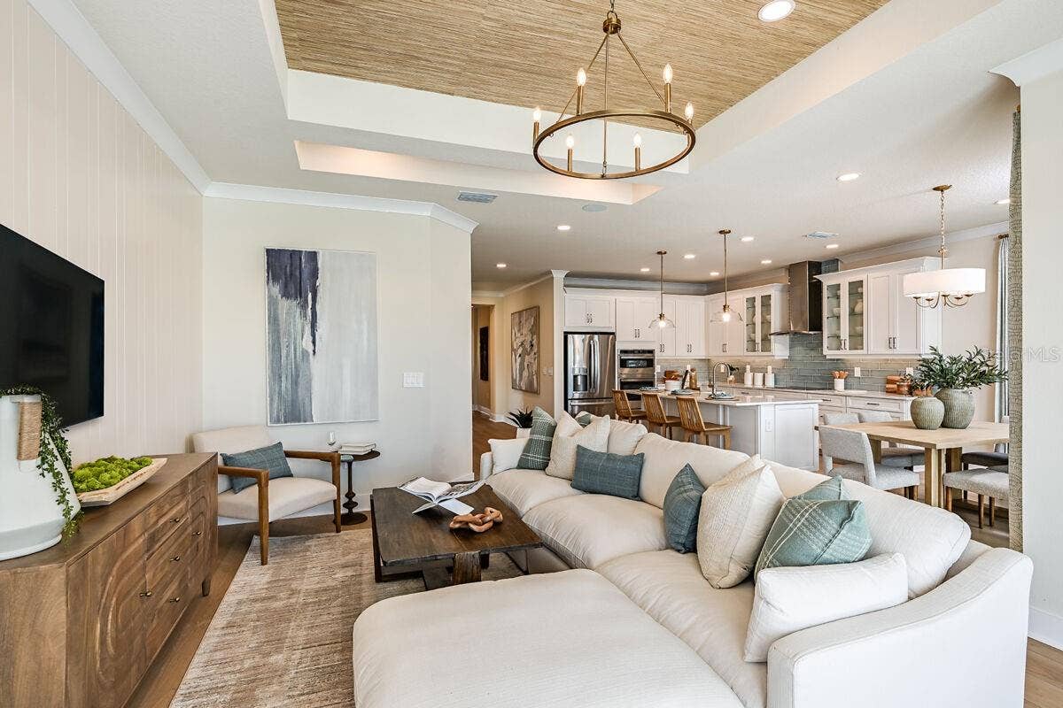 24496 SW KINGSWAY CIRCLE, Lake Suzy, FL 34269 Great Room-Pictures are of Model Home for representational purposes only.
