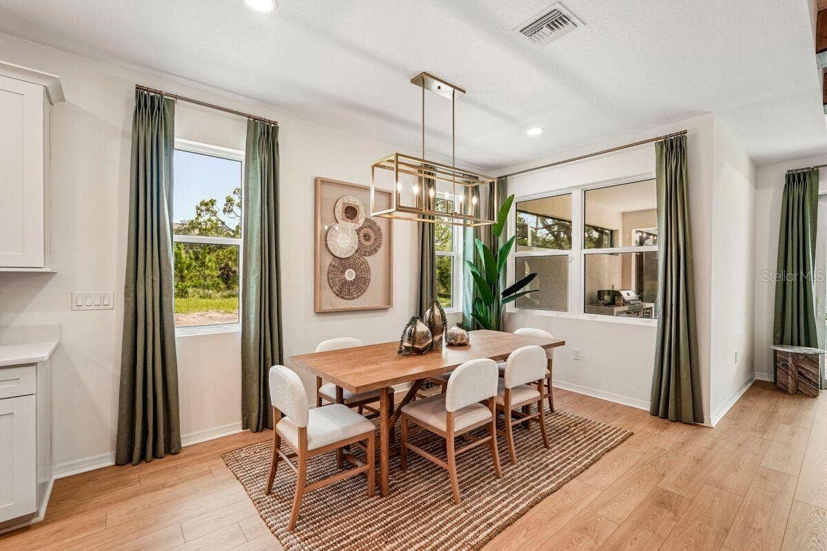 24520 SW KINGSWAY CIRCLE, Lake Suzy, FL 34269 Dining Room-Pictures are of Model Home for representational purposes only.