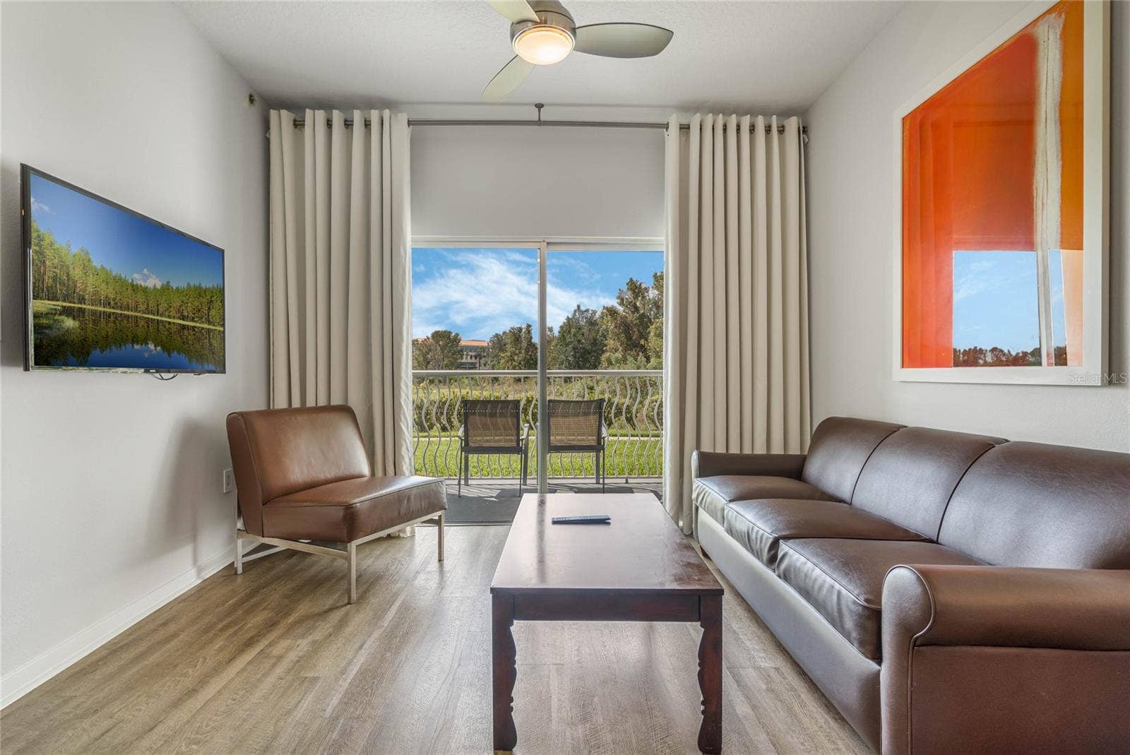 225 CELEBRATION PLACE, #117, Celebration, FL 34747 Living Room